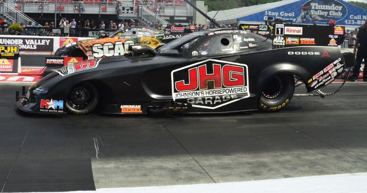 Matt Hagan gets ready to power down the track against Daniel